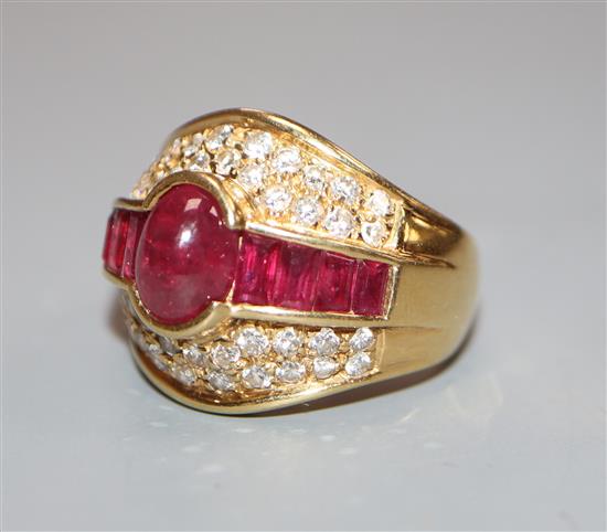 A modern 18ct gold, ruby and diamond cluster dress ring, size K